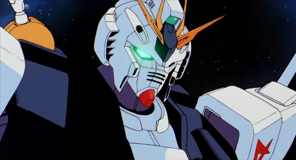 Amuro Ray pilots the Nu Gundam in his final battle against Char Aznable.