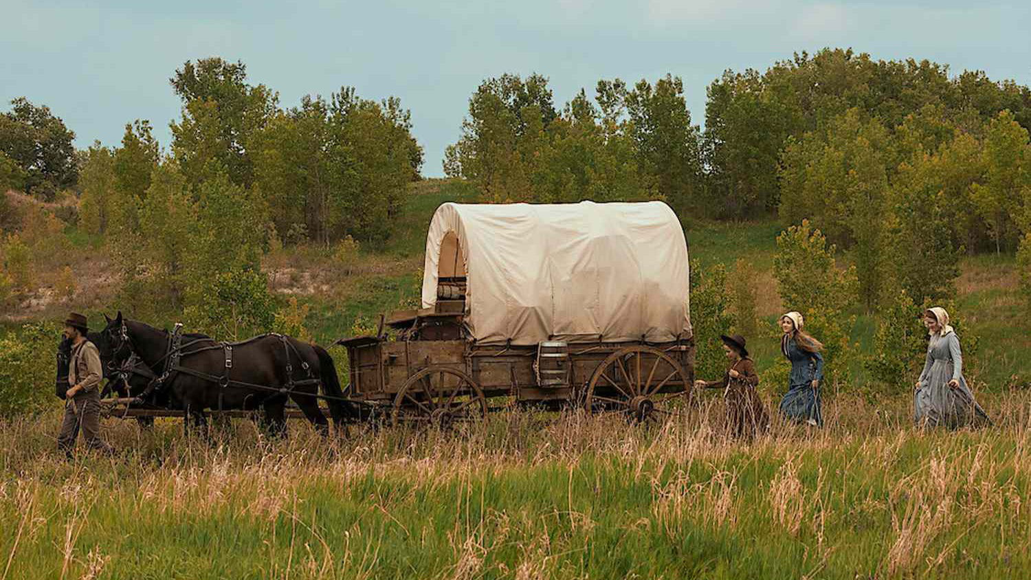 Skywalker Hughes, Alice Halsey, Luke Bracey, and Crosby Fitzgerald in Little House on the Prairie (2026) | Image via Netflix