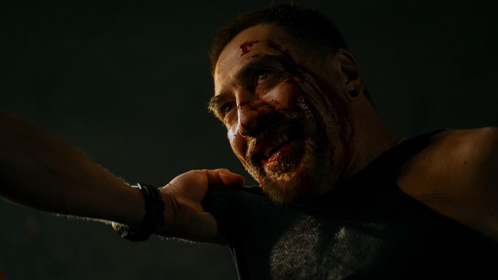 Cape Fear Episode 7 Ending Explained: Who Is Crystal Cady and Why Does She Matter? 6 Bloodied Max Cady grins after being beaten during a confrontation with Tom Bowden in Cape Fear Episode 7.
