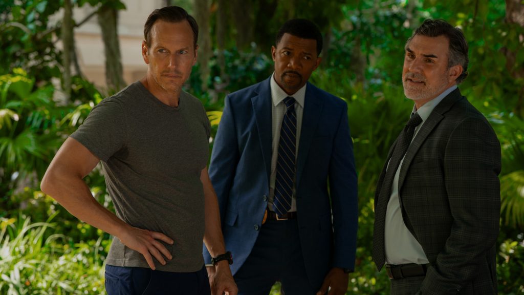 Cape Fear Episode 8 Ending Explained: Did Natalie Pull the Trigger on Max Cady? 5 Tom Bowden stands with two detectives outdoors as they question him in Cape Fear.