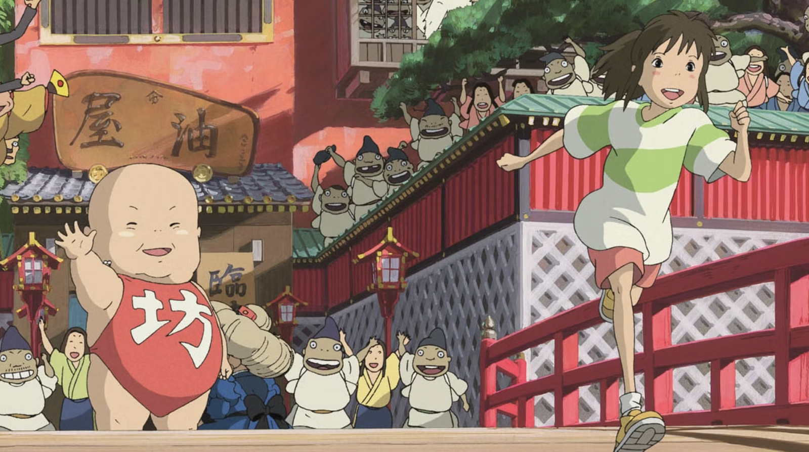 This scene is from the 2001 Academy Award-winning anime film Spirited Away, directed by Hayao Miyazaki. The image depicts the protagonist Chihiro running on a red bridge, chased by spirits from the bathhouse. The giant baby character, Boh, is visible on the left wearing a red bib.