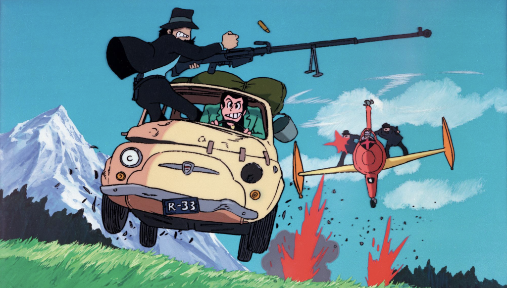 This scene is from the 1979 anime film Lupin III: The Castle of Cagliostro, directed by Hayao Miyazaki. The characters shown are Arsène Lupin III driving, with his partner Daisuke Jigen wielding a large rifle.