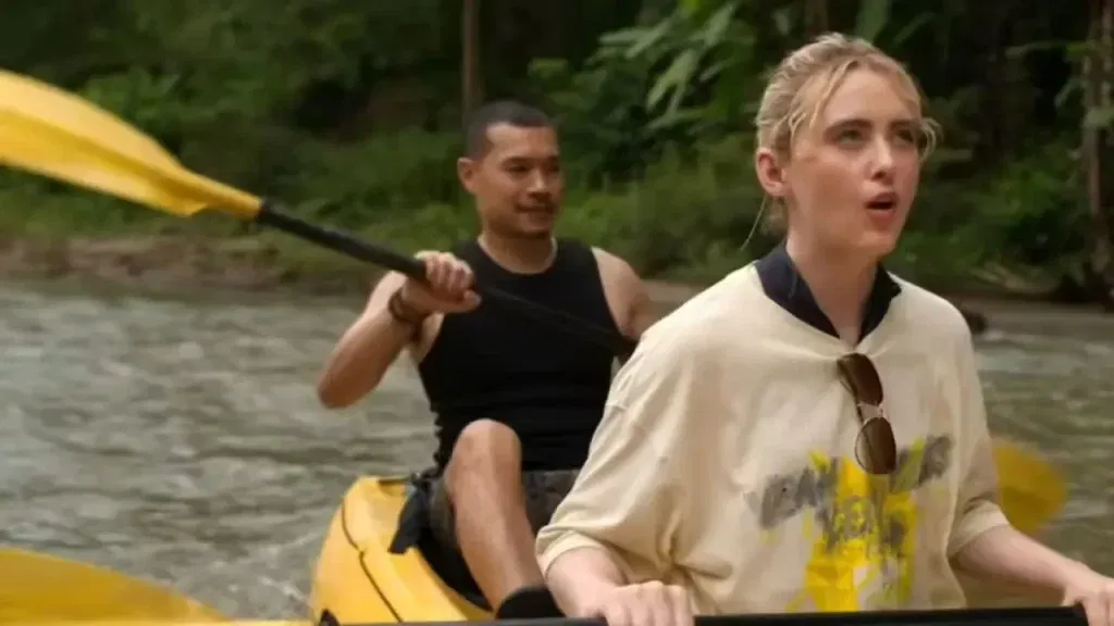 Tayme Thapthimthong as Wat and Kathryn Newton as Sara in The Devil's Mouth