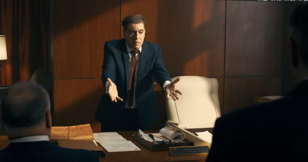 Al Pacino as Jimmy Hoffa arguing with men across a conference table in The Irishman.