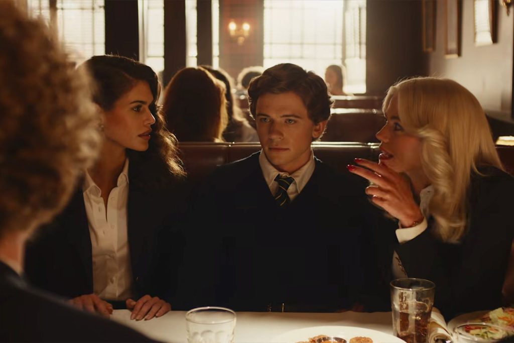 The Shards Episodes 3 & 4 Ending Explained: Are Matt and Rhonda Still Alive? 7 Three young adults in school uniforms sit together at a restaurant table during a tense conversation in The Shards.