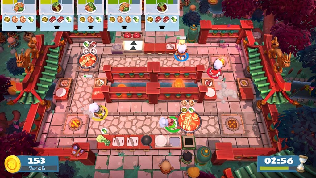 A gameplay screenshot of Overcooked! 2 showing its chaotic cooperative kitchen gameplay.