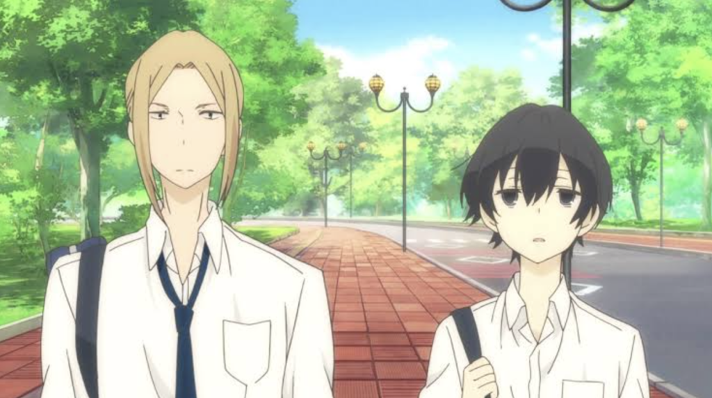 The Most Underrated Comedy Anime of Each Year From the 2010s, Ranked 7 The image features Tanaka (right) and his reliable friend Ohta (left) walking together outdoors from the slice-of-life comedy anime Tanaka-kun is Always Listless.