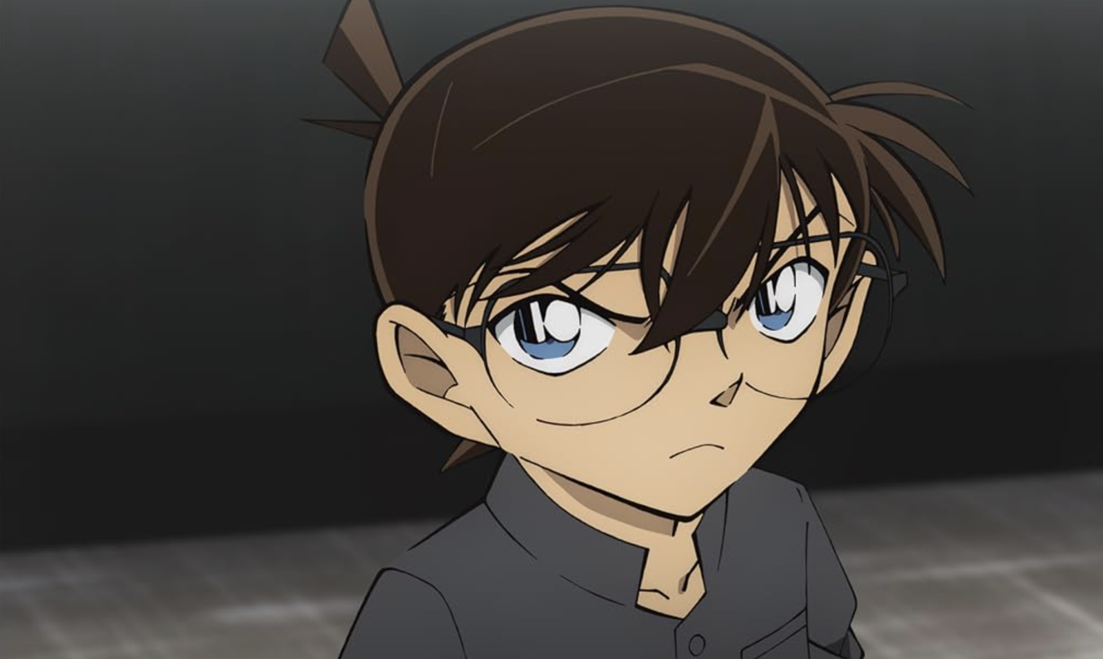 Conan Edogawa is the main character shown in the image from the anime series Detective Conan (also known as Case Closed).