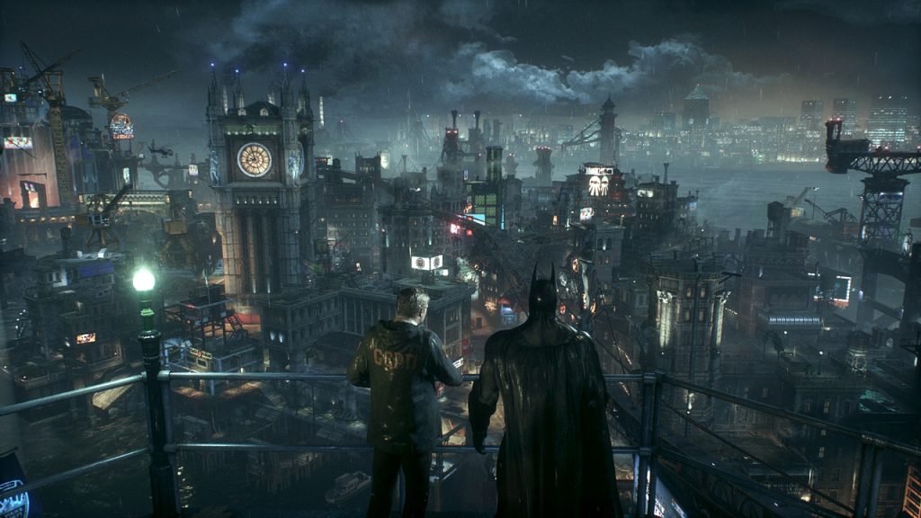  Arkham Knight featuring Batman and policeman Jim Gordon standing on a rooftop overlooking a dark and gloomy Gotham City.