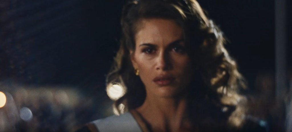 The Shards Episode 6 And 7 Ending Explained: Why Did Rhonda Accuse Susan Of Kidnapping Her? 5 Susan, wearing a homecoming sash, stands in the dark with a tense, wounded expression on her face in The Shards.