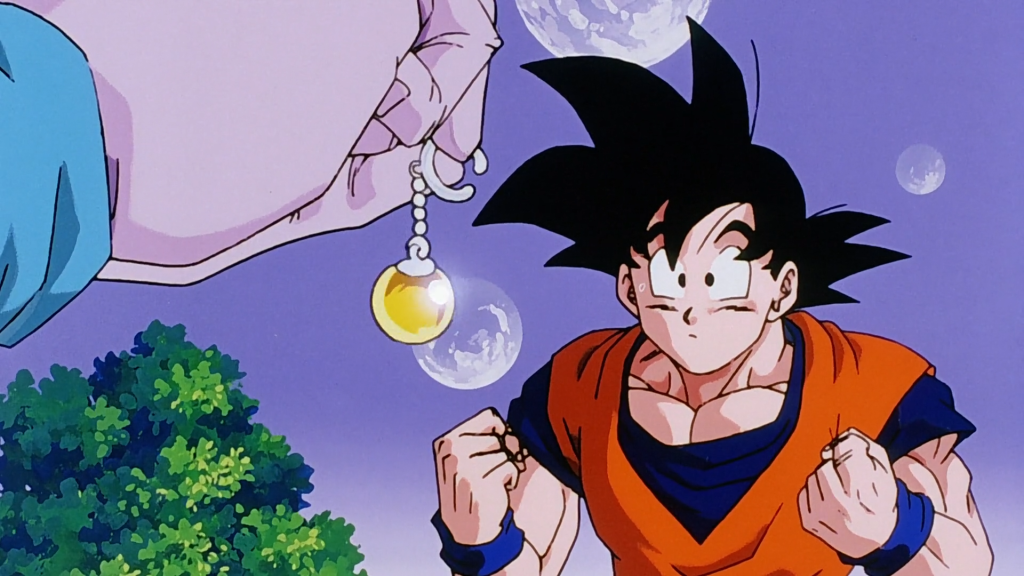 a still from the dragon ball anime series when goku gets the potara fusion ring | credits: toei animation