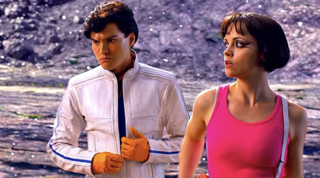 This image appears to show actors Emile Hirsch and Christina Ricci in a scene from the 2008 live-action film Speed Racer. 