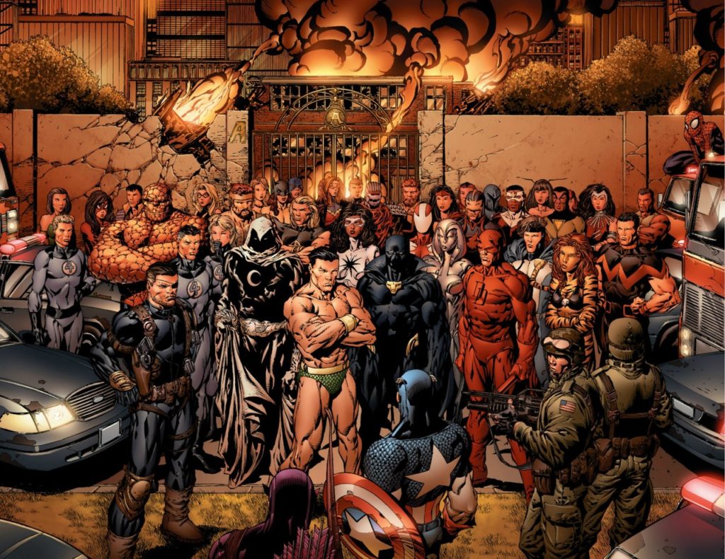 A wide roster of Marvel heroes including Captain America, Daredevil, Moon Knight, Namor, Black Panther, and the Thing stand grim-faced outside the gates of a burning Avengers Mansion at night, with police and military personnel in the foreground.