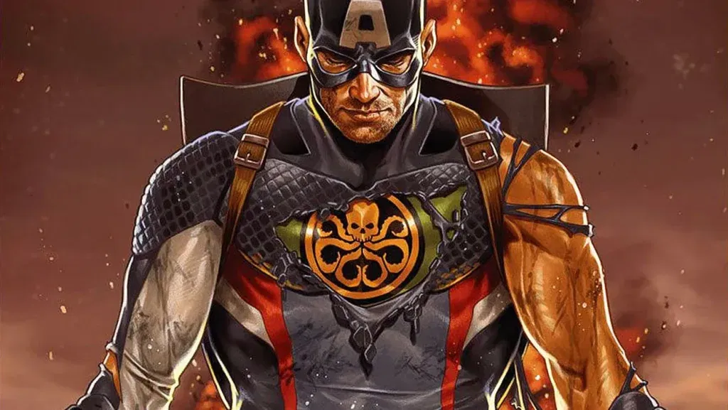 A close-up of Captain America seated on a dark throne, his uniform torn open at the chest to reveal a Hydra skull-and-tentacles emblem, with fire and smoke billowing behind him.