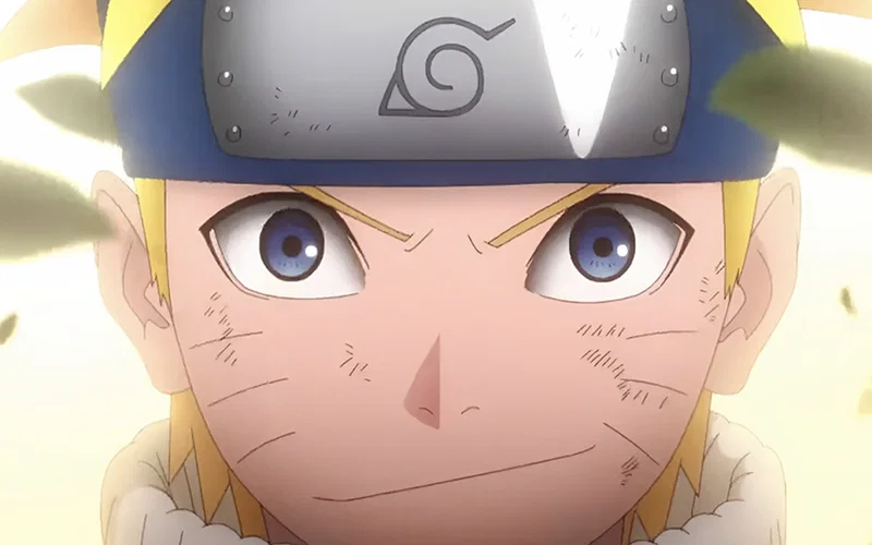 Hình ảnh dường như cho thấy Naruto Uzumaki từ loạt phim hoạt hình Naruto, với chiếc băng đô màu xanh đặc trưng có biểu tượng Làng Lá, mái tóc vàng dựng đứng và những vết râu trên má.